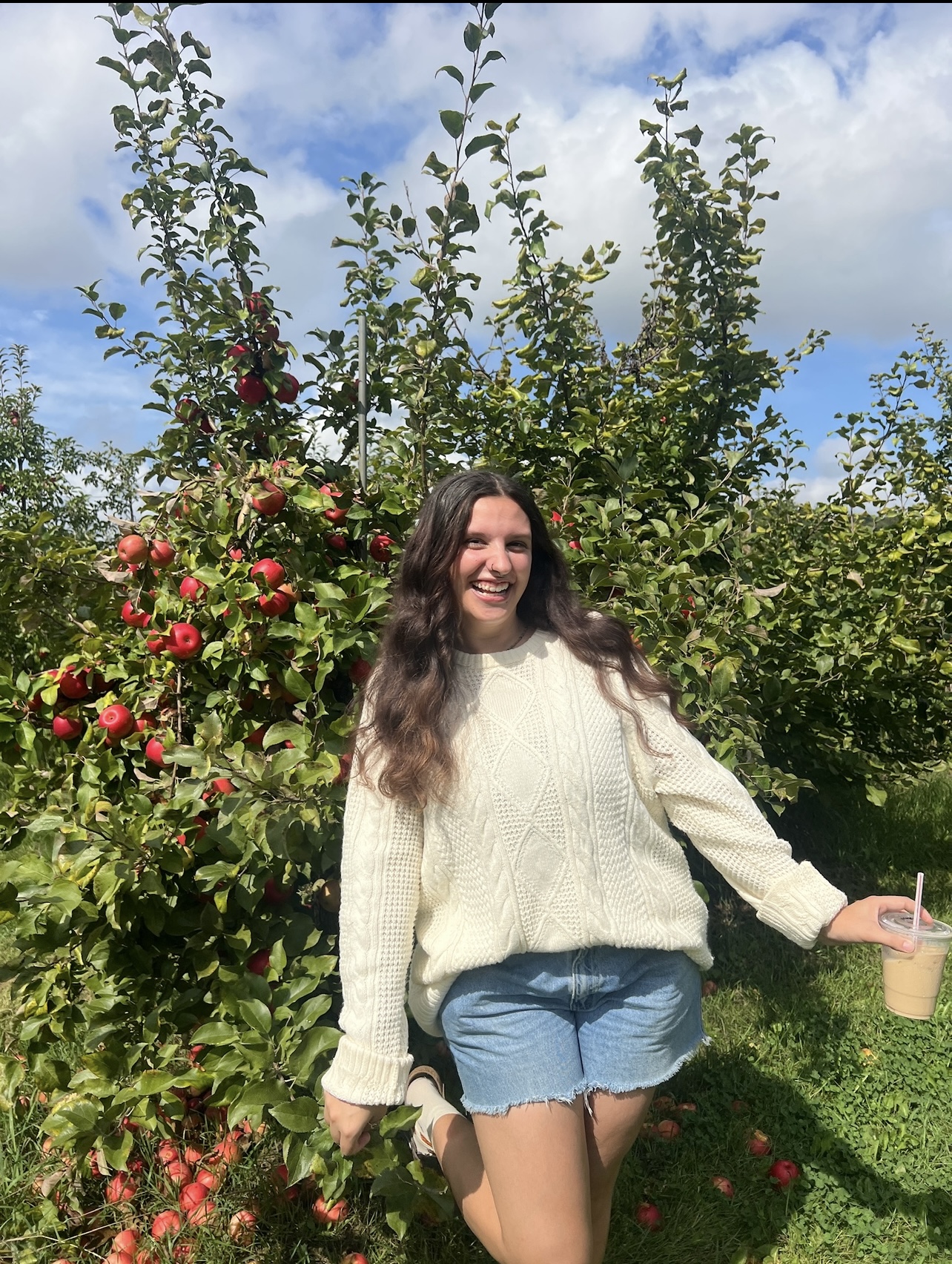 Photo of Maddie in front of tree